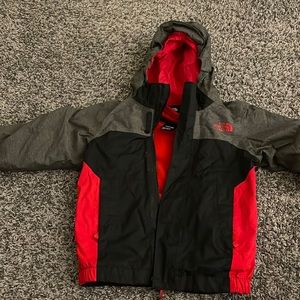 The north face kids triclimate coat in gray, black and red. Size 4T
